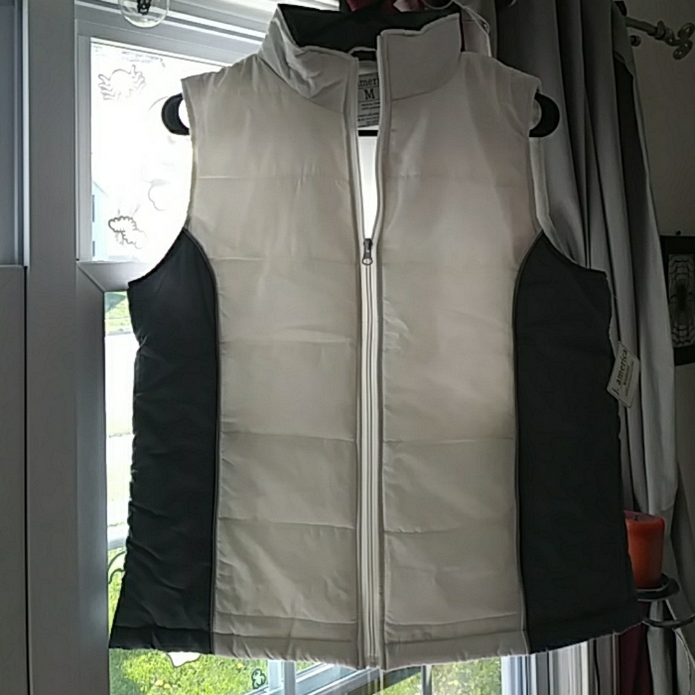 NWT white and grey womens vests. I have 3.
